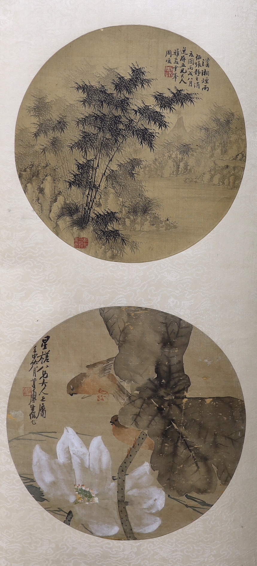 Two Chinese painted and inscribed fan panels on silk, late Qing dynasty, mounted on a scroll, panels 25cm diam.